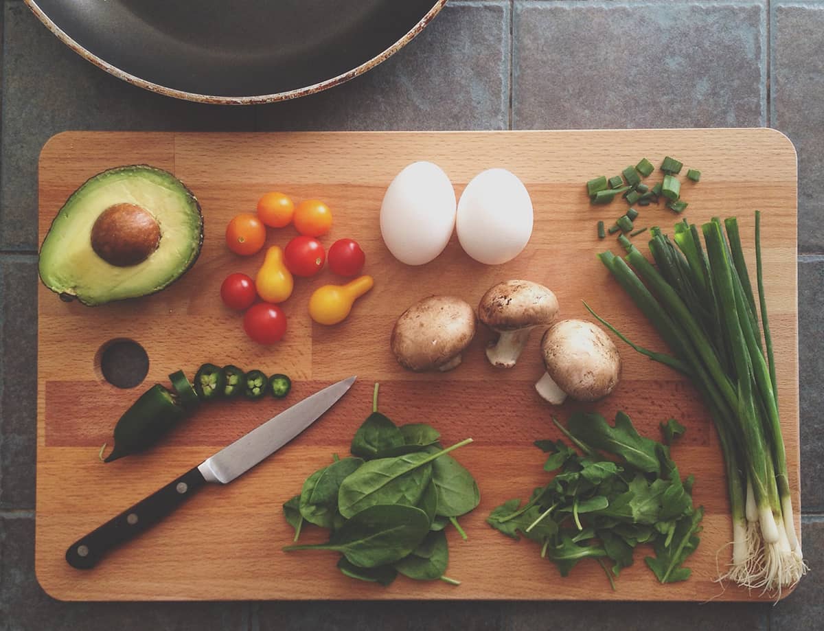 teaching teens to cook. an image of chopped vegetables on a cutting board.